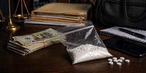 Evidence related to possession with intent to sell or deliver charges in Tennessee including packaged substances and cash