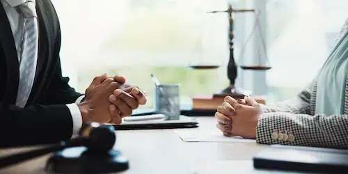 Client consulting a Nashville violent crimes defense attorney